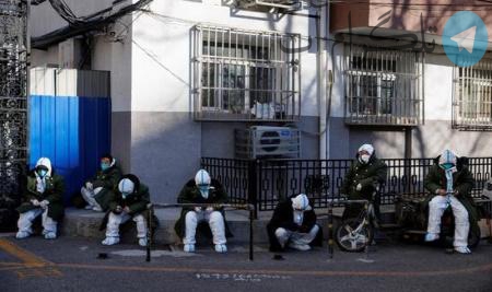 نگهبانی ماموران قرنطینه در شهر پکن + عکس – تلگرام آپ